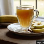 입덧 완화 방법 - A serene morning breakfast scene featuring a rustic wooden table set with a light, soothing meal: ri...